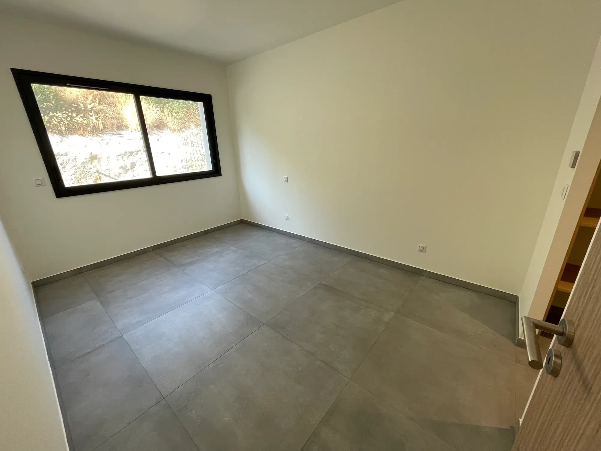 Première chambre de l'appartement 104