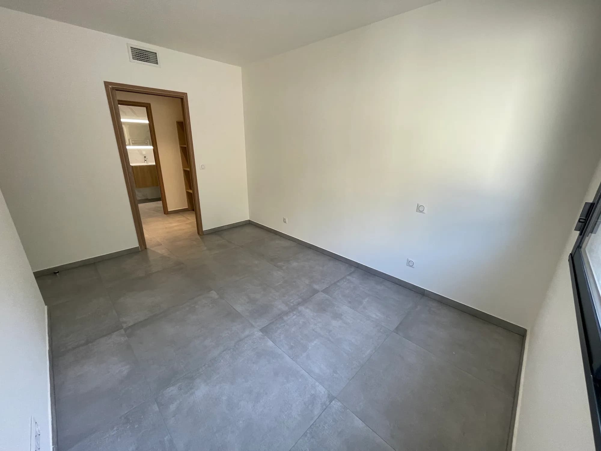 Troisième chambre de l'appartement 104